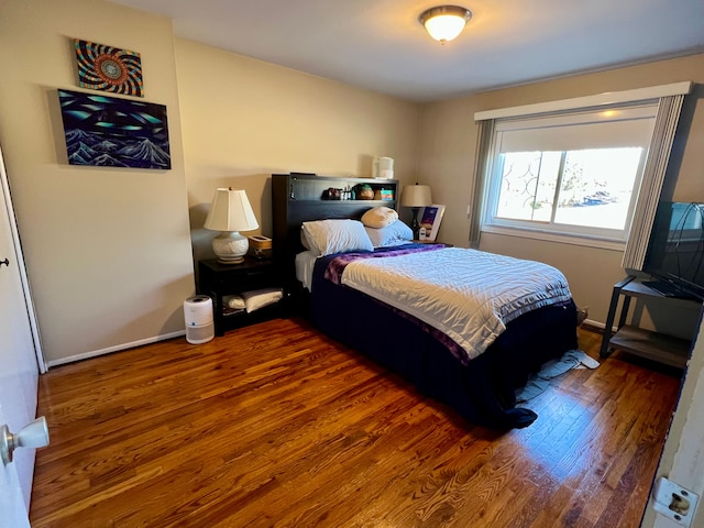 bedroom featuring hardwood / wood-style floors