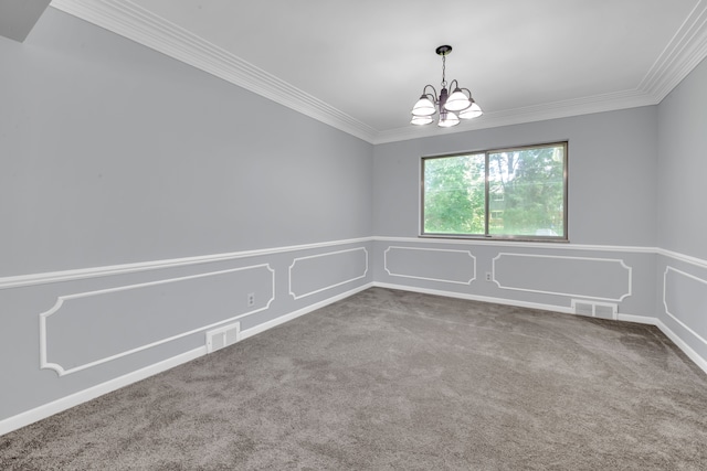 carpeted empty room featuring ornamental molding and a notable chandelier