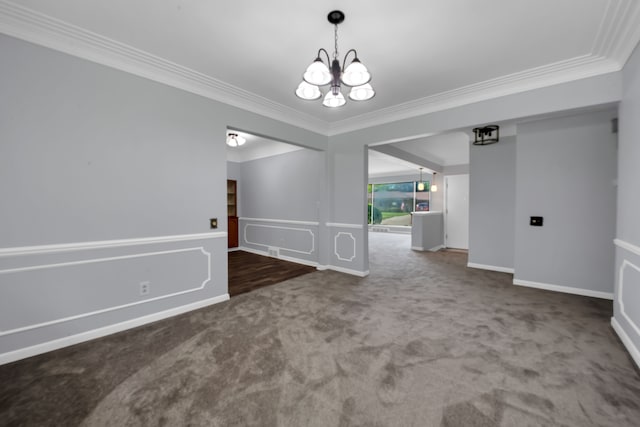 unfurnished dining area with a notable chandelier, crown molding, and carpet flooring