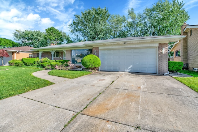 single story home with a garage and a front yard