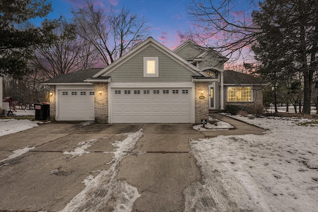 view of front of property with a garage