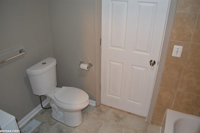 bathroom featuring toilet