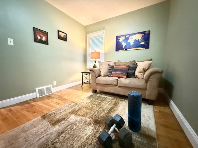 living room with hardwood / wood-style floors