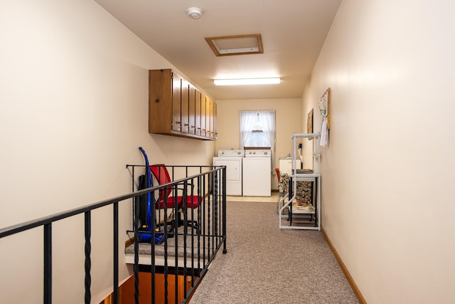 hall with independent washer and dryer and carpet floors