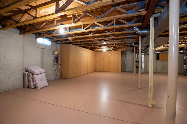 basement featuring heating unit