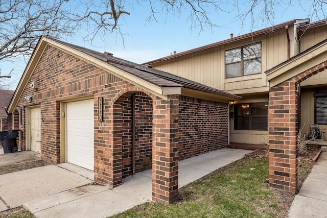 view of side of home featuring brick siding