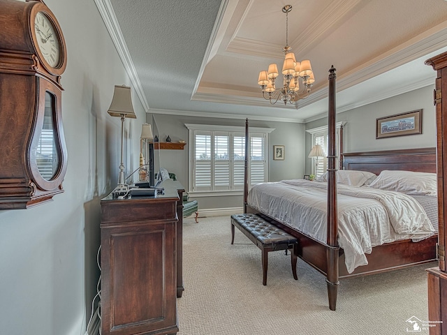 bedroom featuring an inviting chandelier, light carpet, a textured ceiling, ornamental molding, and a raised ceiling