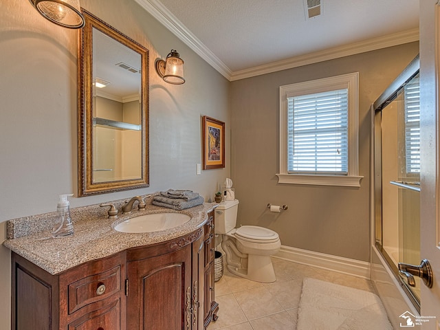 full bathroom with tile patterned floors, toilet, crown molding, vanity, and enclosed tub / shower combo