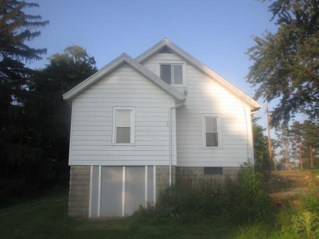 view of property exterior at dusk