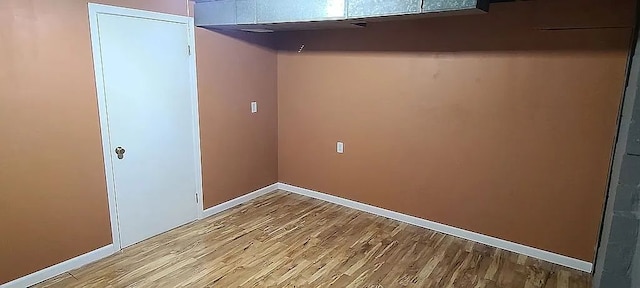 laundry area featuring light hardwood / wood-style floors