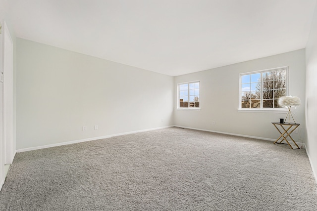 unfurnished room with carpet