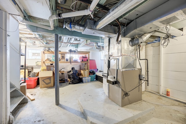 basement featuring heating unit