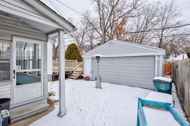 view of snow covered garage