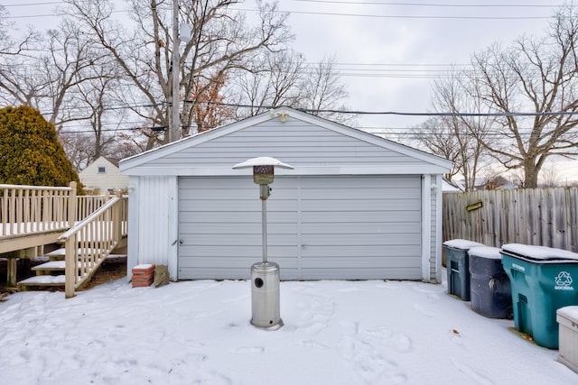 view of snow covered garage