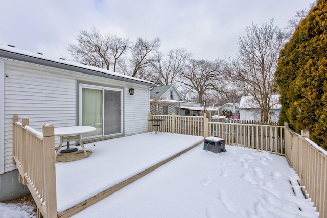 view of snow covered deck