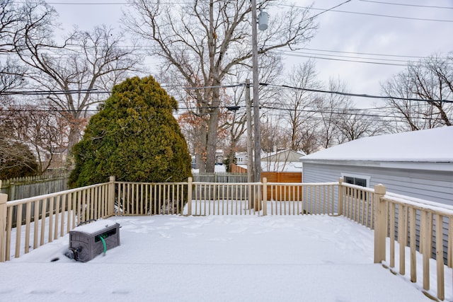 view of snow covered deck