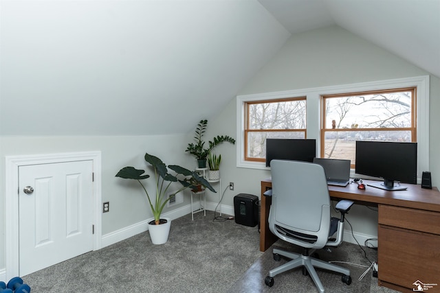 office area featuring lofted ceiling and carpet flooring