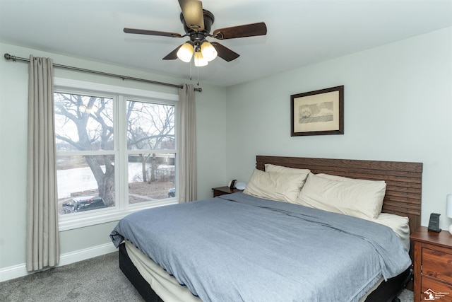 bedroom with ceiling fan and carpet