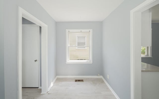 corridor featuring light wood-type flooring