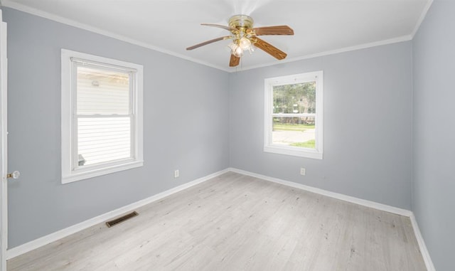 unfurnished room with ornamental molding, ceiling fan, and light hardwood / wood-style floors