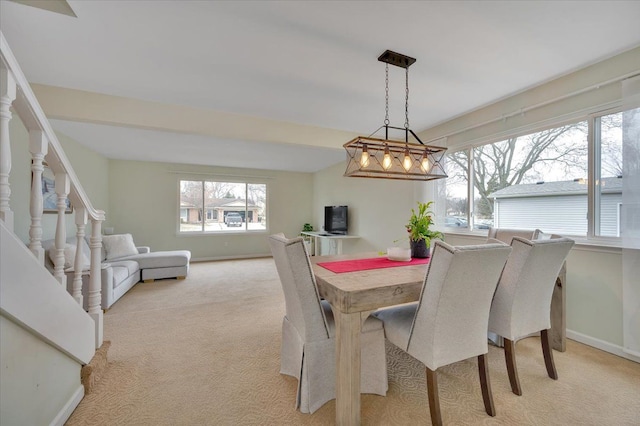 view of carpeted dining area