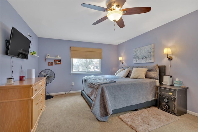 bedroom with light colored carpet and ceiling fan