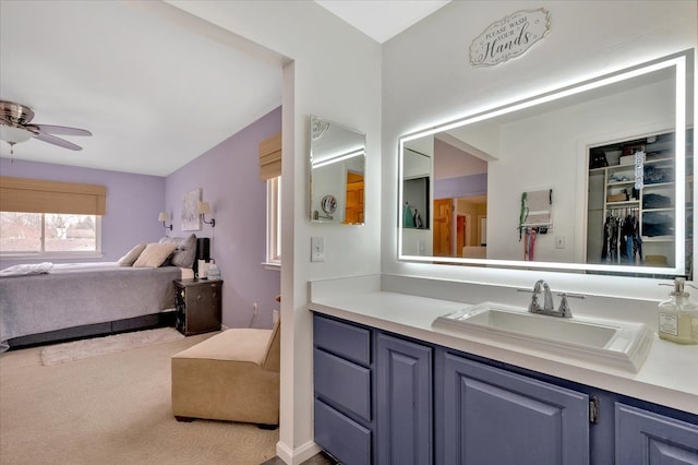 bathroom with vanity and ceiling fan