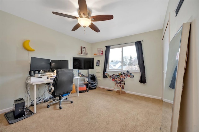 office featuring ceiling fan and light colored carpet