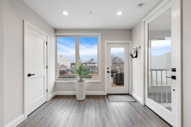 doorway to outside featuring light hardwood / wood-style flooring