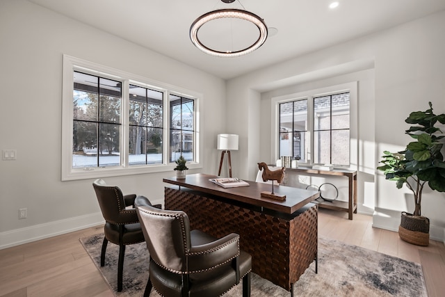 office area with light hardwood / wood-style flooring