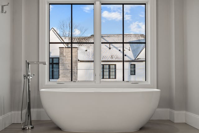 bathroom with a washtub