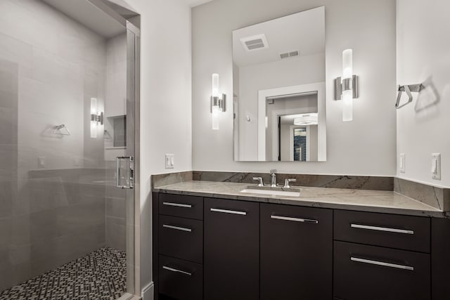 bathroom featuring vanity and walk in shower