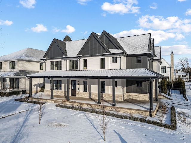 modern farmhouse style home featuring a porch