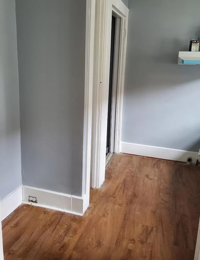 hallway featuring light wood-type flooring