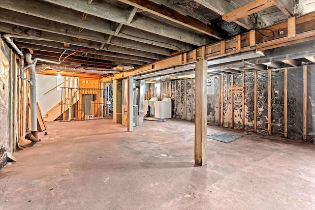 basement with independent washer and dryer