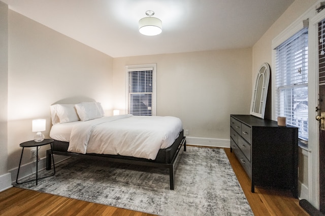 bedroom featuring wood-type flooring