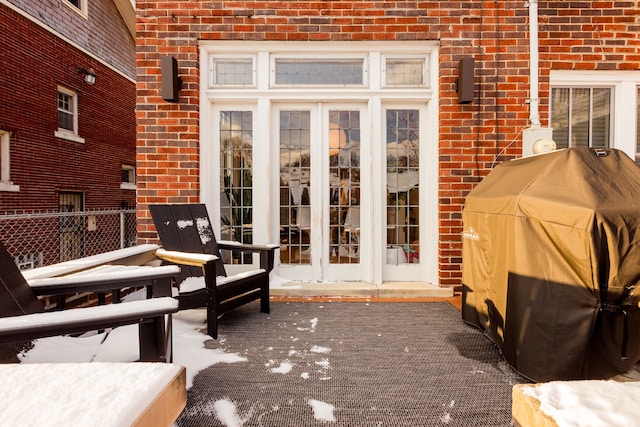 view of patio / terrace featuring a grill and french doors