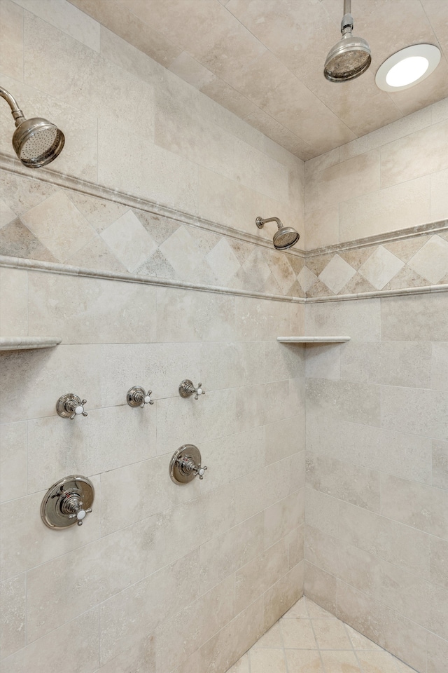 bathroom with tiled shower