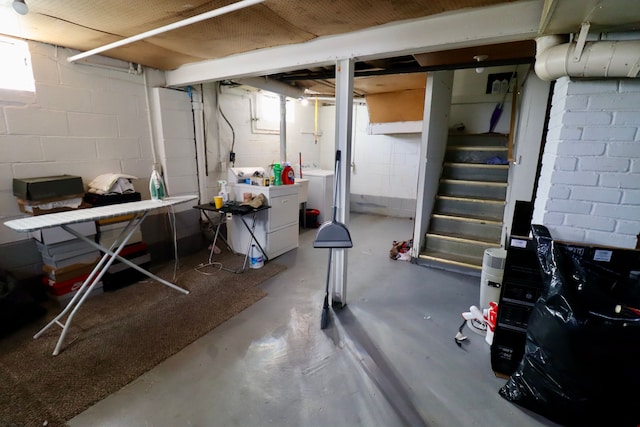 basement with separate washer and dryer