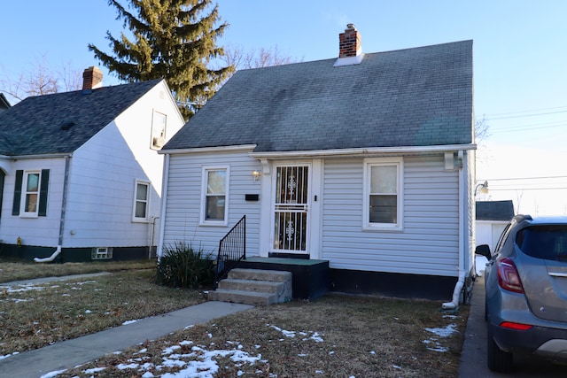 view of new england style home