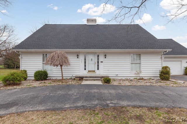 ranch-style home with a garage