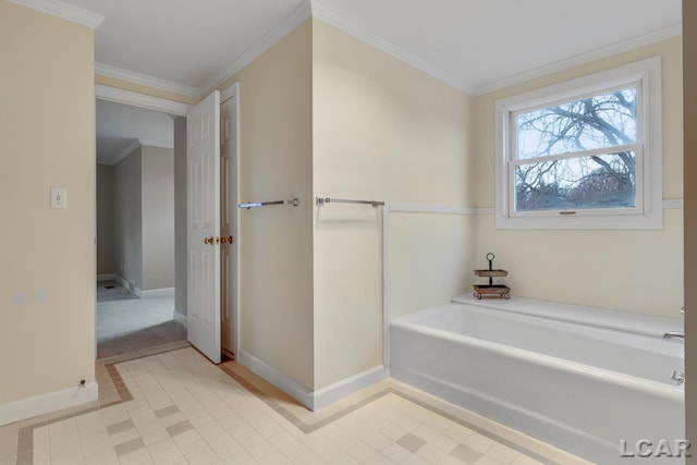 bathroom with ornamental molding, a bathing tub, and tile patterned flooring