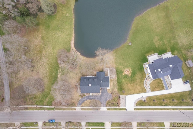 drone / aerial view with a water view