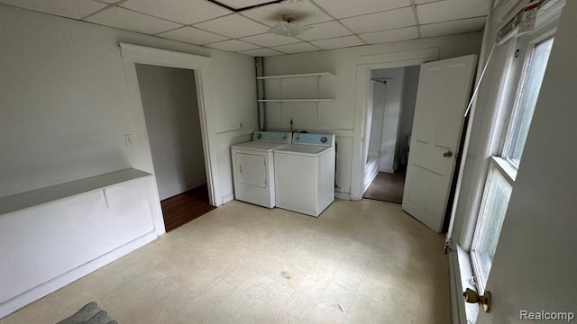 clothes washing area featuring washer and dryer