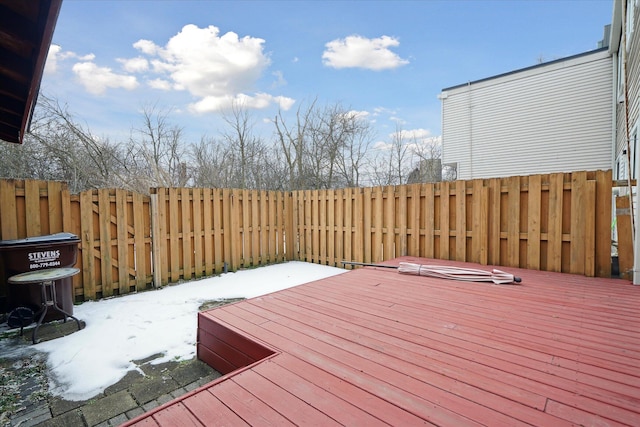 view of snow covered deck