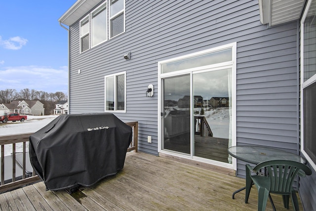 wooden deck featuring grilling area