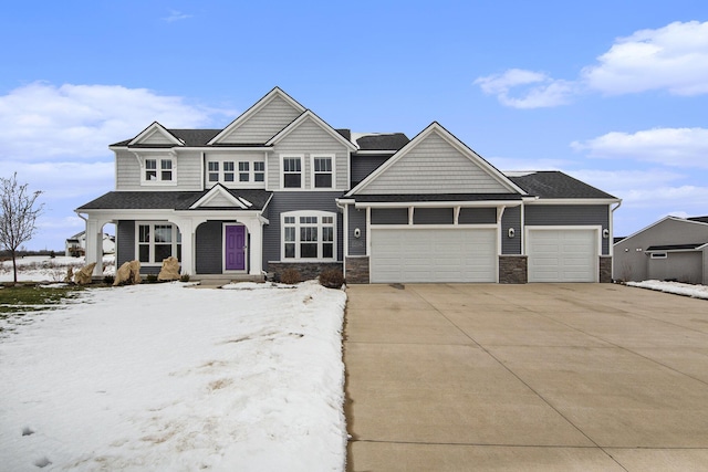 view of front of property with a garage