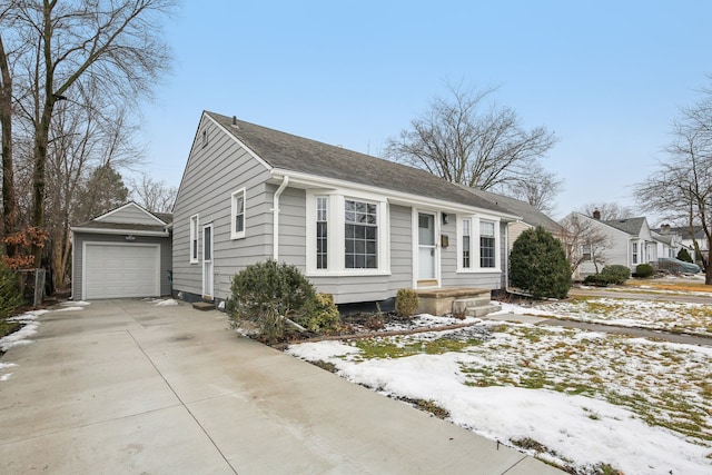 view of front of house with an outbuilding and a garage