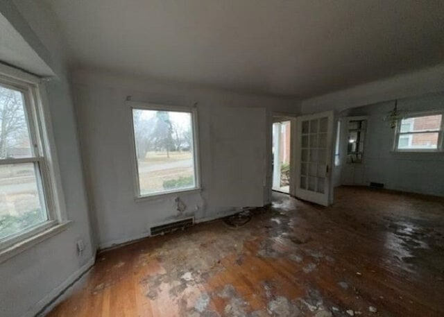 miscellaneous room with dark hardwood / wood-style floors