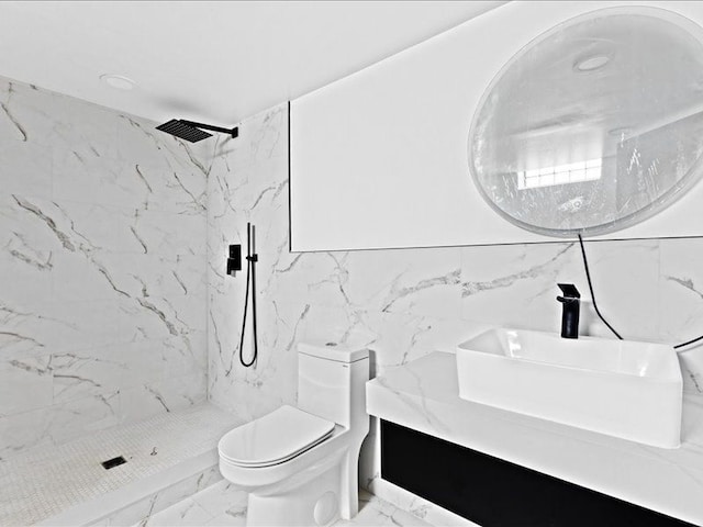 bathroom featuring sink, a tile shower, tile walls, and toilet